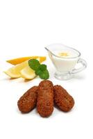 kibbeh with dry curd and lemon photo