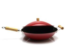 beautiful red wok on white background photo