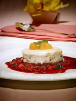 Panna cotta, delicious Italian dessert with cream, sugar, vanilla and lemon zest photo