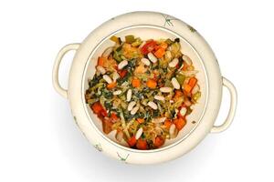 Tuscan Ribollita soup step by step with white beans, celery, chard, onions and olive oil photo