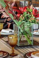 table arrangements and decoration with flowers and fruits photo