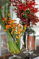 table arrangements and decoration with flowers and fruits photo