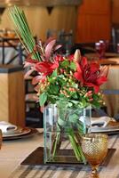 table arrangements and decoration with flowers and fruits photo