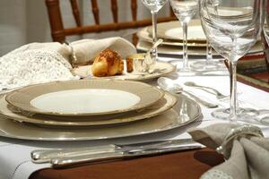 table set up for formal dining with all the details photo