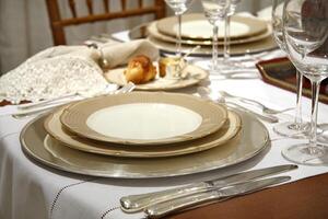 table set up for formal dining with all the details photo