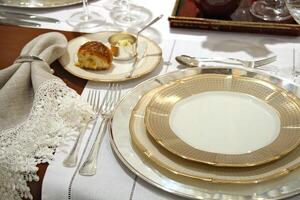 table set up for formal dining with all the details photo