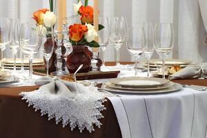 table set up for formal dining with all the details photo