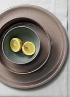 beautiful ceramic dishes with Sicilian lemons photo