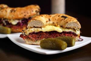 Pastrami sandwich with cabbage, cheese, sauce, pickles on ciabatta bread photo