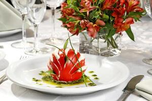 caprese tomato with buffalo mozzarella and truffled olive oil photo