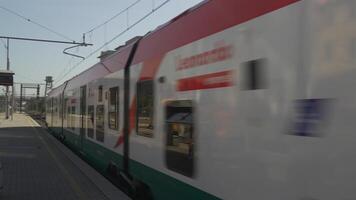 October 9, 2023. Rome. Italy. Roma Trastevere train station. Passengers wait for train at Trastevere railroad station in Rome Italy in sunny summer weather. Public railway system in Italy. Trenitalia. video