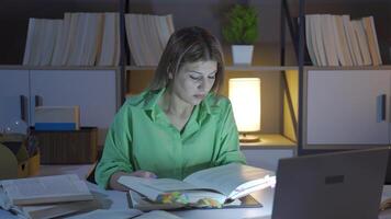 Researcher woman reading a book. video