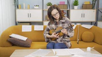 Learning and playing the violin. video