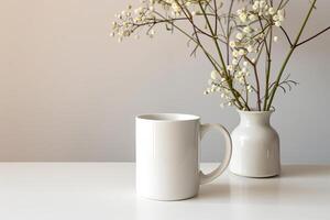 white 11oz ceramic mug on kitchen table with decorations, soft light, stockphoto image photo