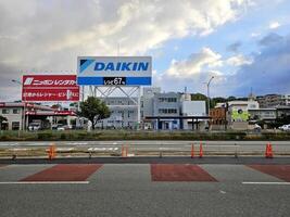 Fukuoka, Japan November 14, 2023 Daikin billboard sign. It is is a leading innovator and worldwide provider of advanced, high-quality air conditioning and heating solutions. photo