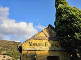 Yufuin, Japan November 12, 2023 Yufuin Floral sign. It is a famous landmark at Yufuin. photo