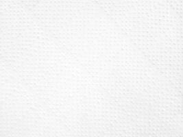 White paint on dot metal wall background. photo