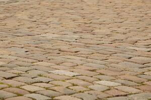 Street pavement texture in tiles. Grey rectangular old tiles. For text. Background. Horizontal. photo