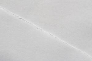 White paper texture background with torn edge, copy space photo