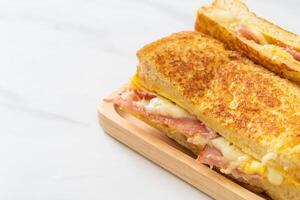 French toast ham bacon cheese sandwich photo