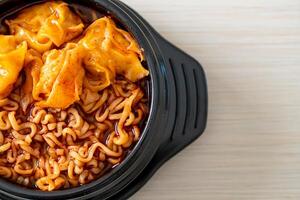 Korean instant noodles with dumplings photo