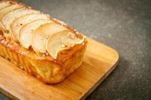 apple loaf crumbled on wood board photo