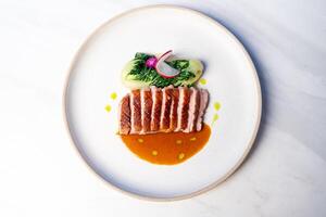 grilled duck breast steak with sauce photo