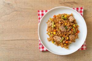 pork fried rice on white plate photo