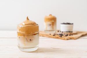 Iced Dalgona Coffee, a trendy fluffy creamy whipped coffee photo