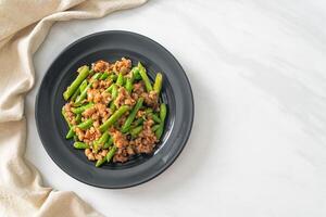 stir-fried french bean or green bean with minced pork photo