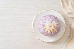 taro bun with white sugar cream and nut photo