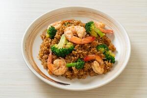 fried rice with broccoli and shrimps photo