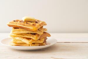 waffle stack with butter and honey photo