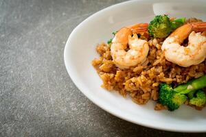 fried rice with broccoli and shrimps photo