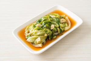 Stir fried Iceberg lettuce with Oyster sauce photo