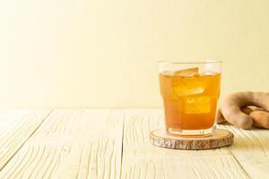 Delicious sweet drink tamarind juice and ice cube photo