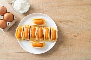 flat pancake roll with sausage photo