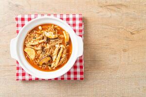 Stir-fried Spicy Mushroom with Tom Yum Soup photo