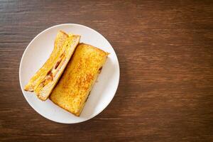 French toast ham bacon cheese sandwich photo