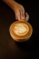 Wing Latte Art in cafe shop. photo