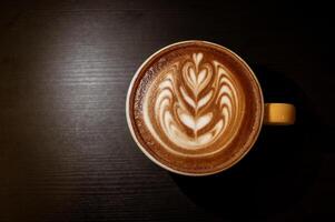 Wing Latte Art in cafe shop. photo
