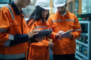 A group of Robotics engineers working with Programming and Manipulating Robot Hand, Industrial Robotics Design, High Tech Facility, Modern Machine Learning. Mass Production Automatics. photo