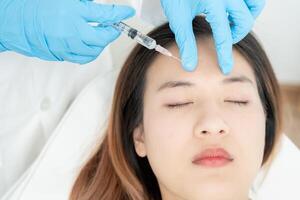 Cosmetic surgery, skin whitening injection, filler injection, Skin reface, beautiful Asian girls receive beauty treatments at beauty clinic, skincare, pore rejuvenation, wrinkle, baby face photo