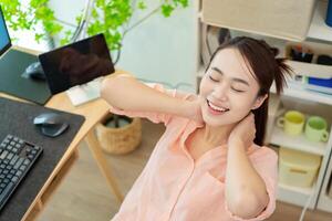 Young Asian woman at home photo