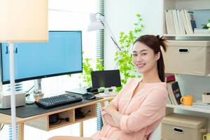 Young Asian woman at home photo