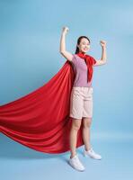 Young Asian woman wearing a red cloak photo