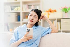 Photo of young Asian girl at home