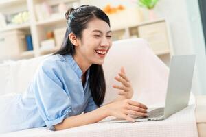 Photo of young Asian girl at home