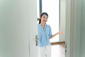 Young Asian woman at home photo