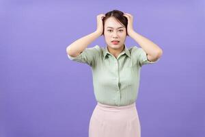 Photo of young Asian woman on purple background